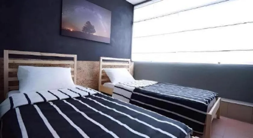 Bed in Koptel Budget Hotel