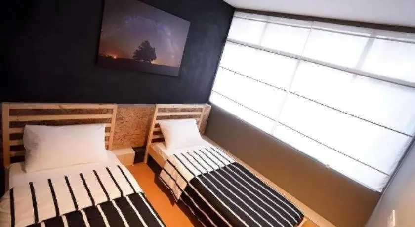 Bed in Koptel Budget Hotel