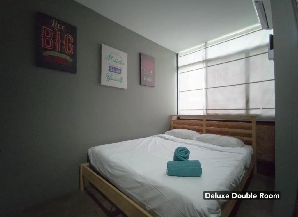 Bed in Koptel Budget Hotel