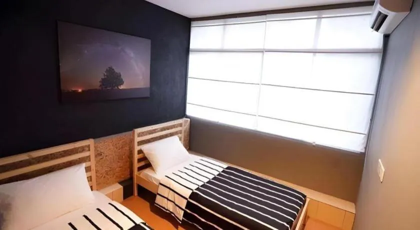 Bed in Koptel Budget Hotel