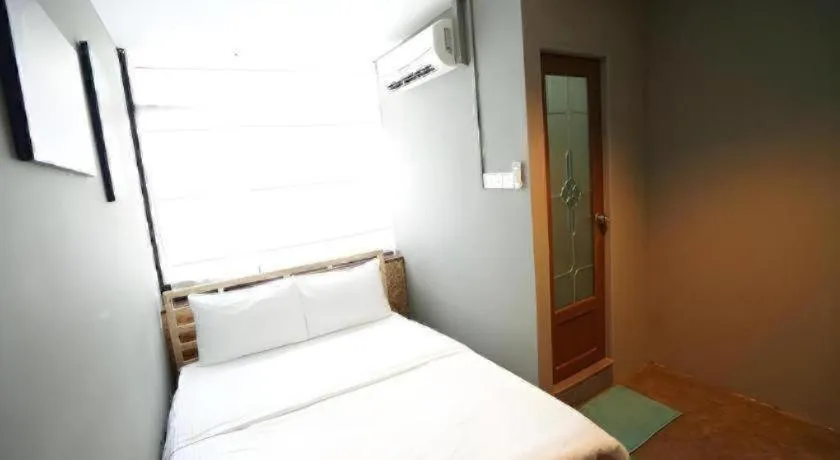 Bed in Koptel Budget Hotel