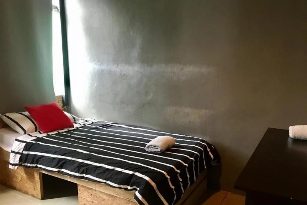 Bed in Koptel Budget Hotel