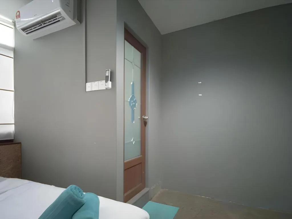 Bed in Koptel Budget Hotel