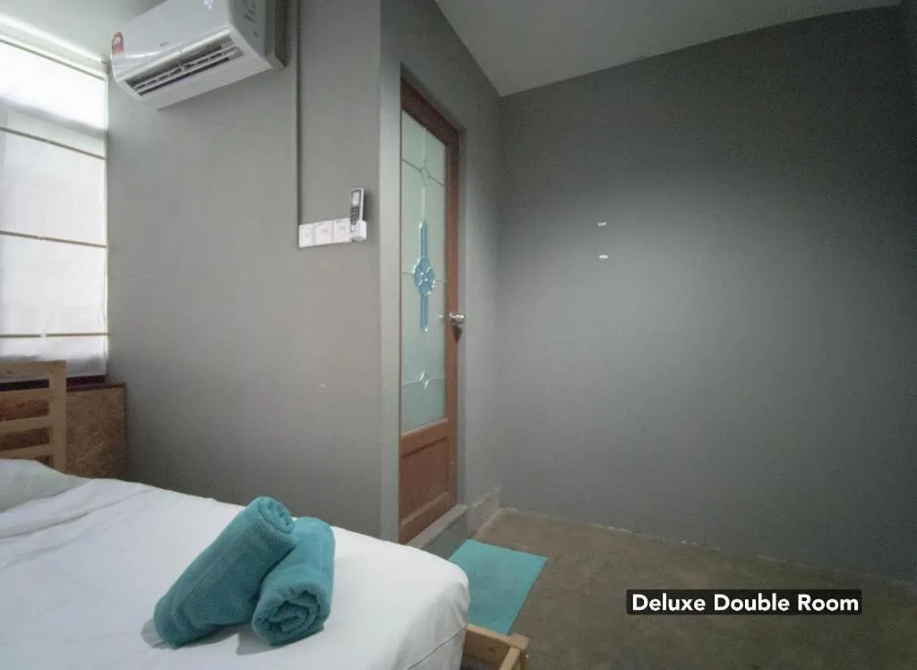 Bed in Koptel Budget Hotel