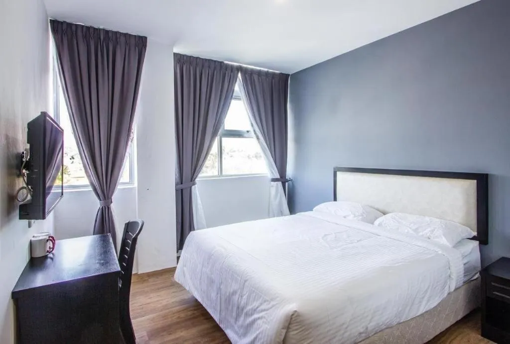 Bed in Big Orange Hotel Jitra