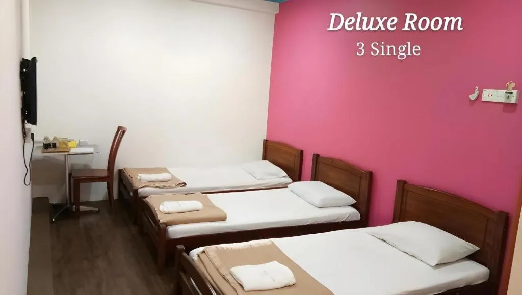 Bed in Twin Star Hotel