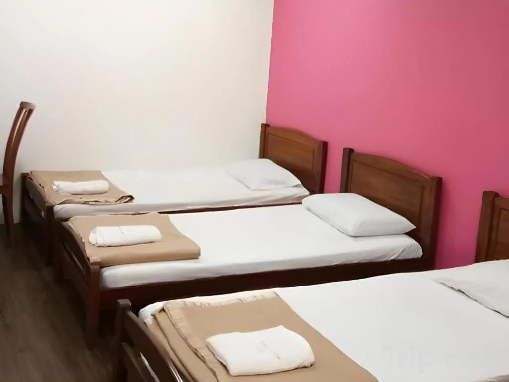 Bed in Twin Star Hotel