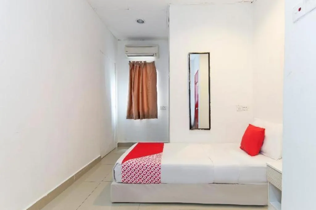 Bed in OYO 304 Zero Hour Hotel