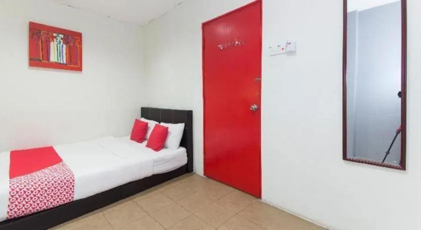 Bed in OYO 304 Zero Hour Hotel