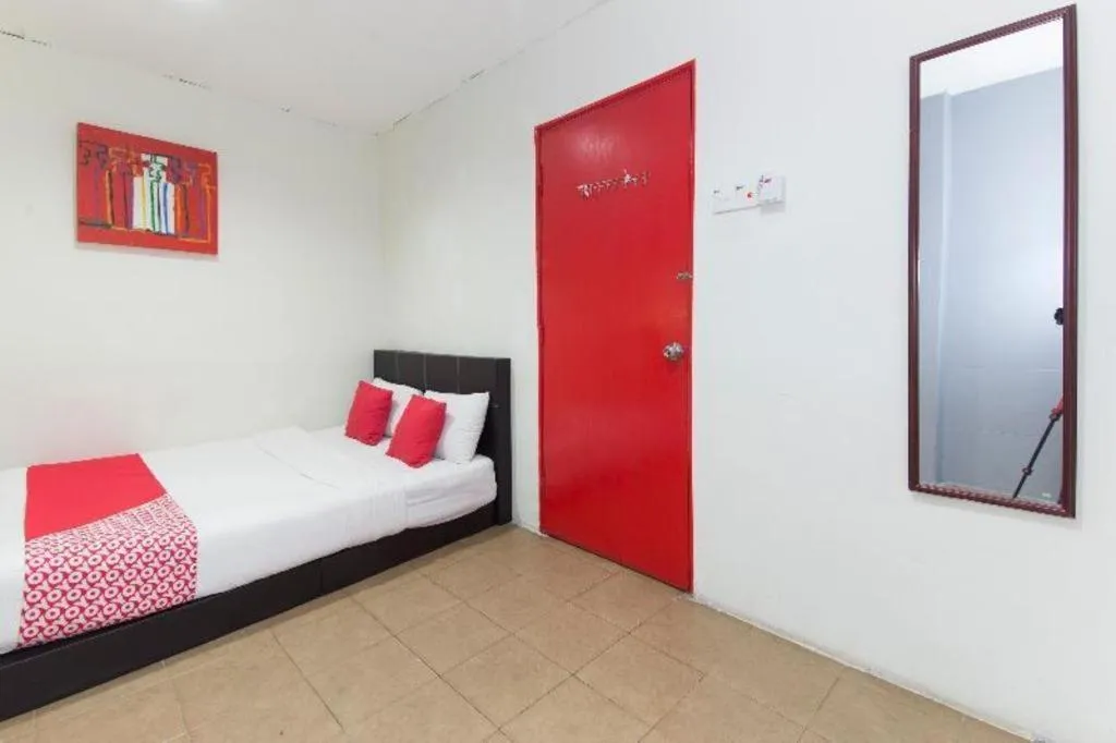 Bed in OYO 304 Zero Hour Hotel