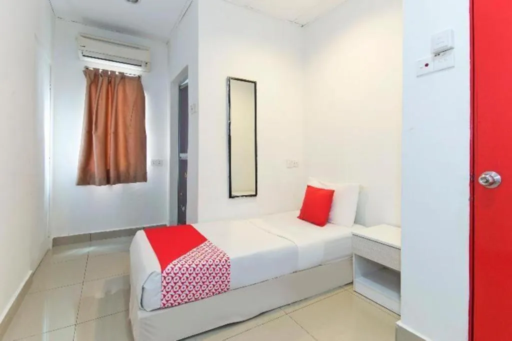 Bed in OYO 304 Zero Hour Hotel