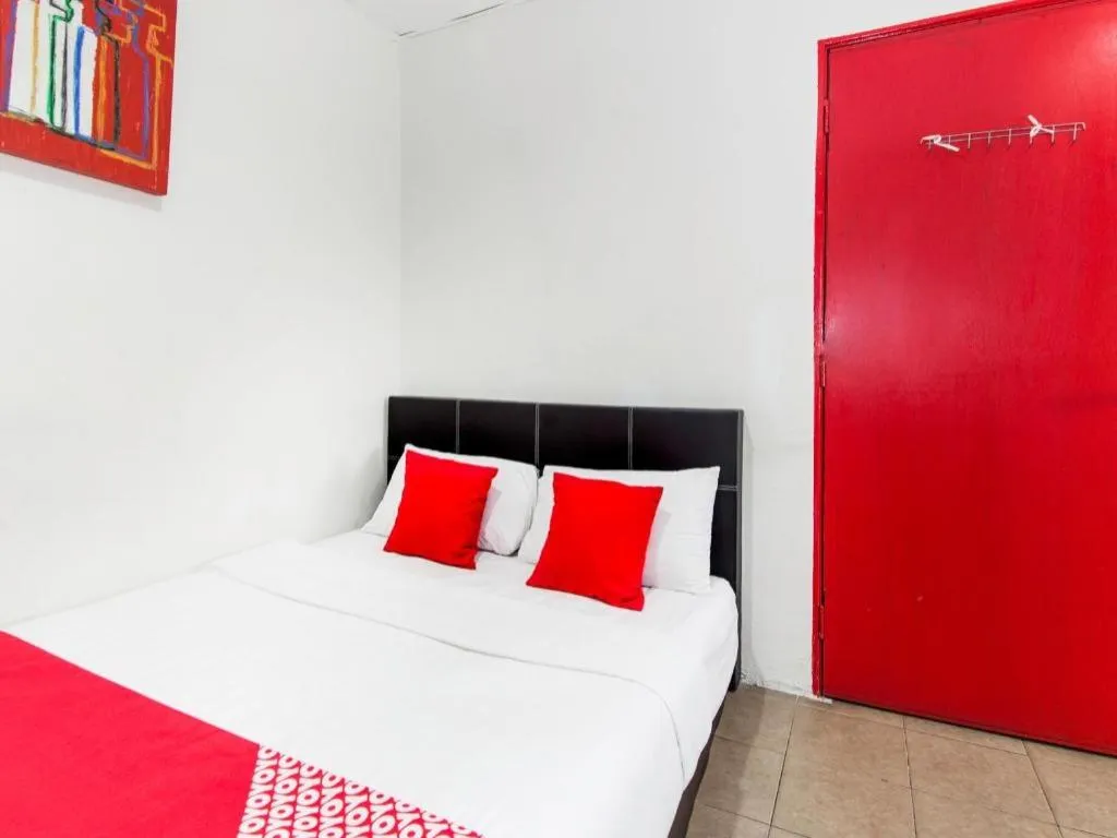 Bed in OYO 304 Zero Hour Hotel