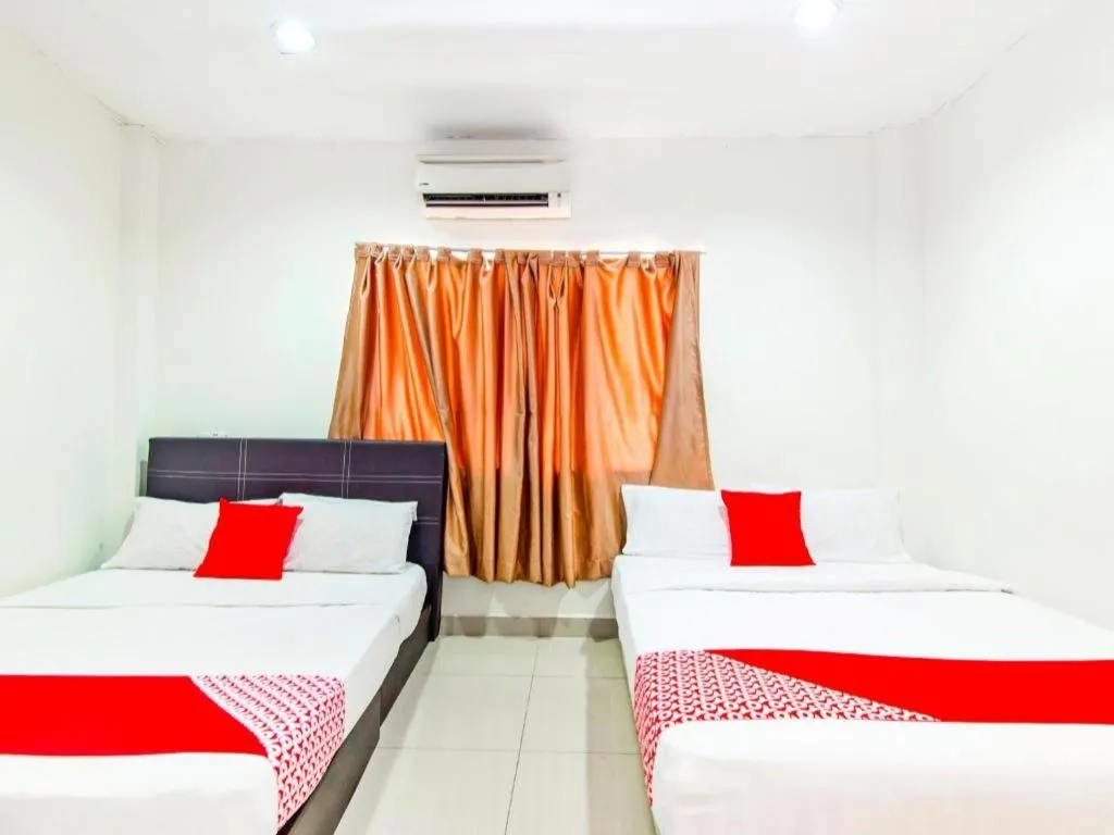 Bed in OYO 304 Zero Hour Hotel