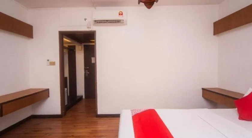 Bed in OYO 304 Zero Hour Hotel