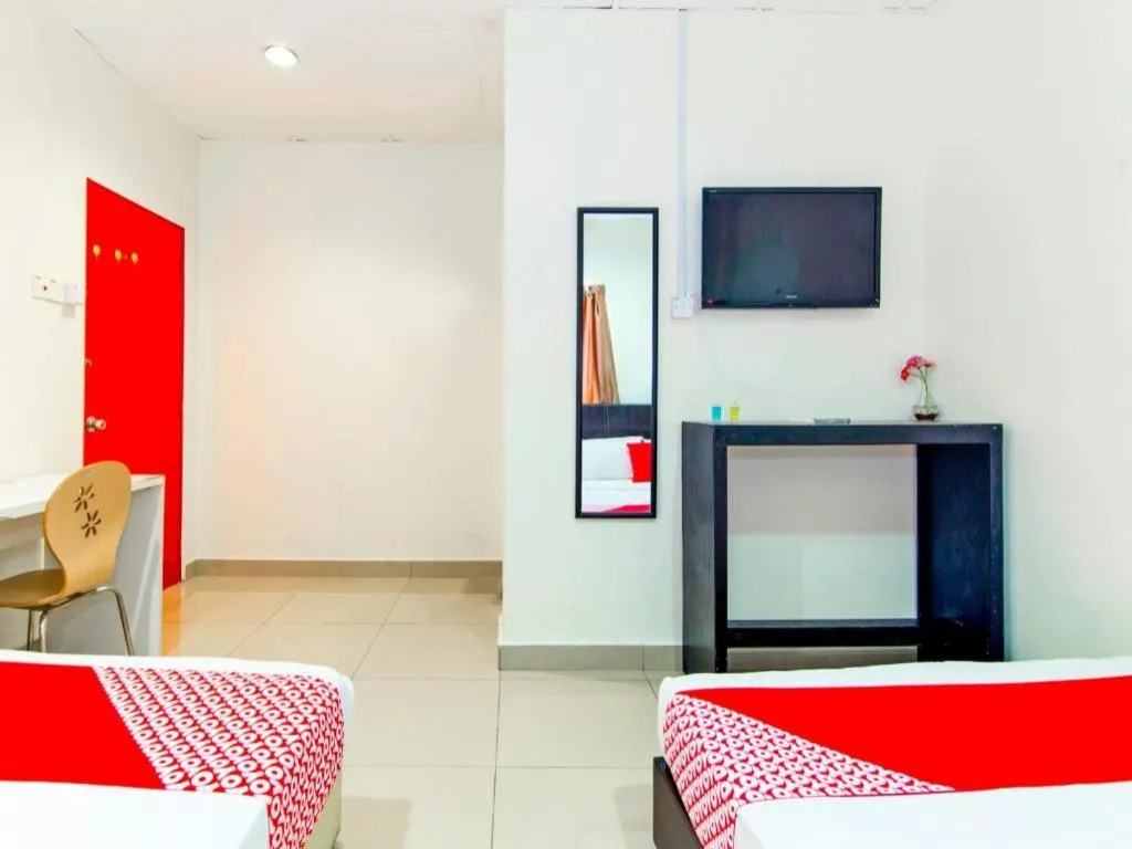 Bed in OYO 304 Zero Hour Hotel