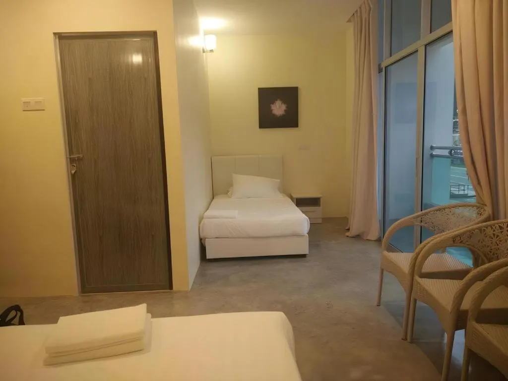 Bed in Hotel Pangkor Mutiara