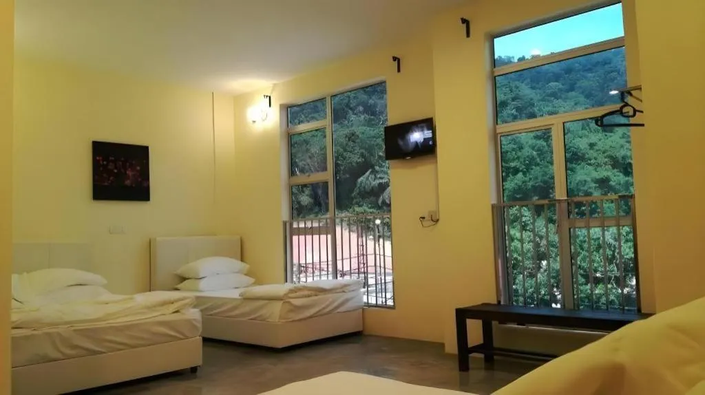 Bed in Hotel Pangkor Mutiara