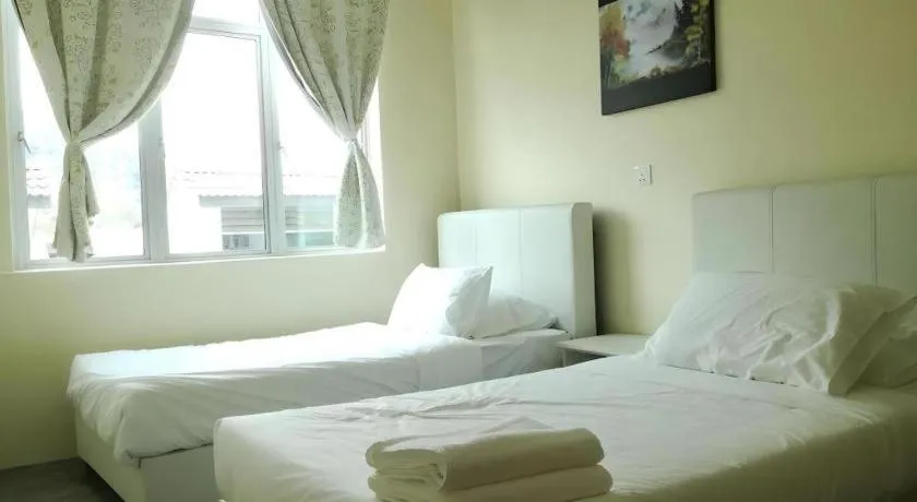 Bed in Hotel Pangkor Mutiara