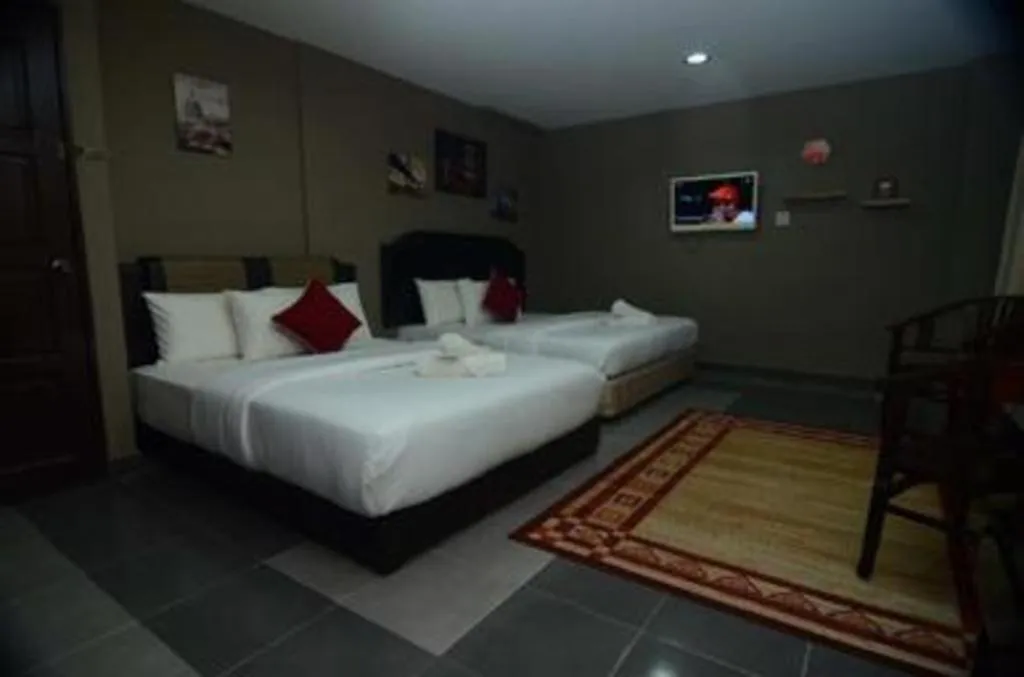 Bed in AMT BUDGET HOTEL