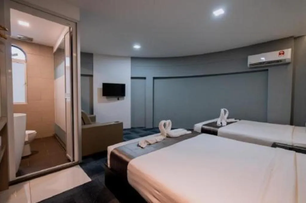 Bed in Kimal Hotel Taiping