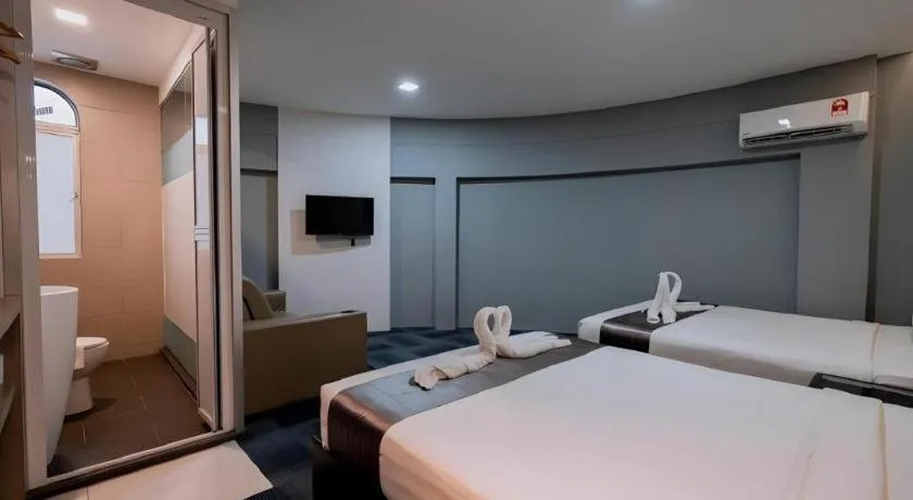 Bed in Kimal Hotel Taiping