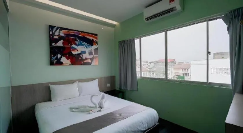 Bed in Kimal Hotel Taiping