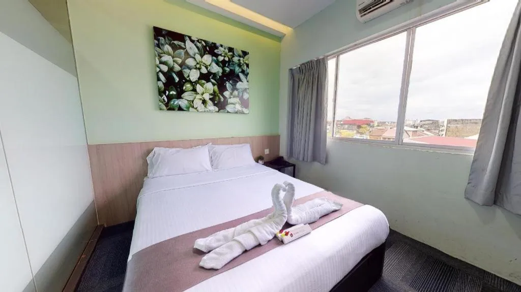 Bed in Kimal Hotel Taiping