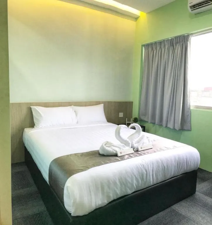 Bed in Kimal Hotel Taiping