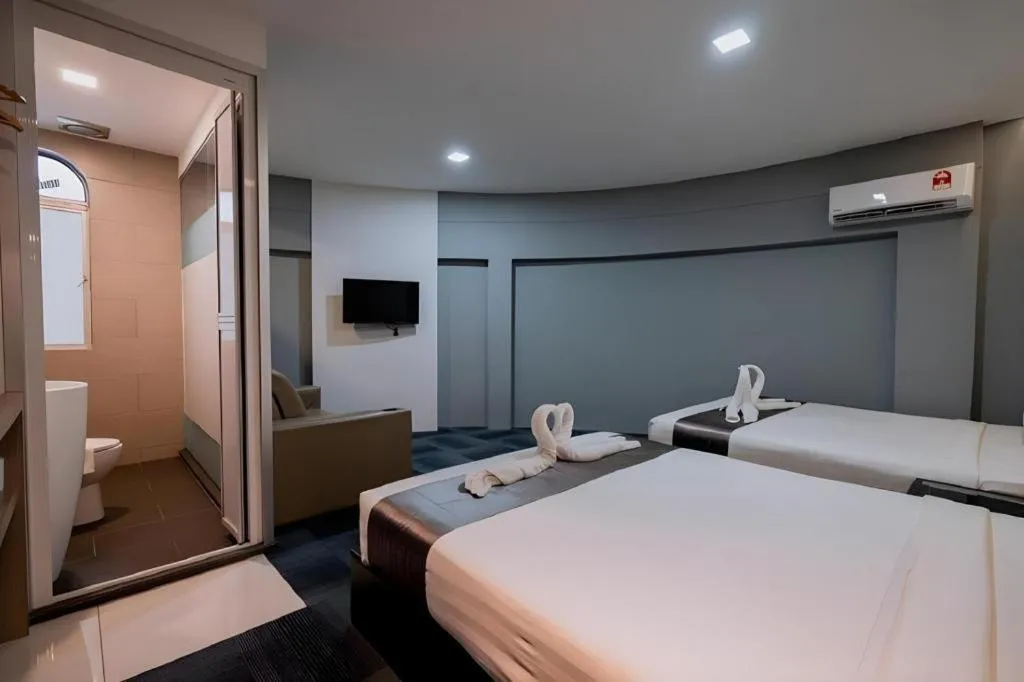 Bed in Kimal Hotel Taiping