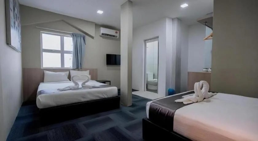 Bed in Kimal Hotel Taiping