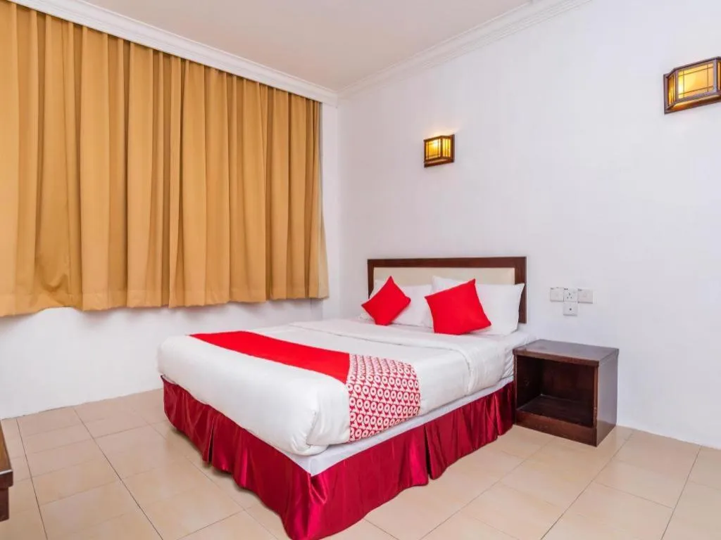 Bed in Super OYO 1114 Neo Pegasus Hotel