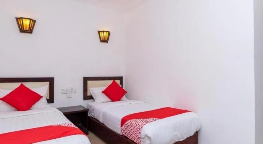 Bed in Super OYO 1114 Neo Pegasus Hotel