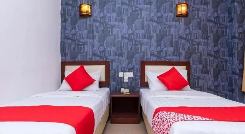 Bed in Super OYO 1114 Neo Pegasus Hotel