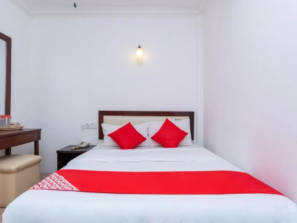 Bed in Super OYO 1114 Neo Pegasus Hotel