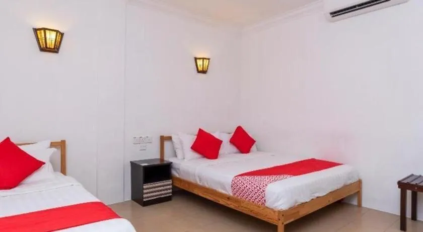 Bed in Super OYO 1114 Neo Pegasus Hotel