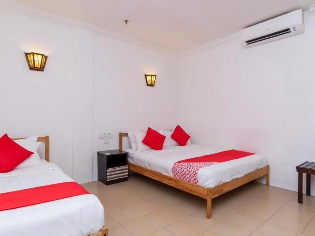 Bed in Super OYO 1114 Neo Pegasus Hotel