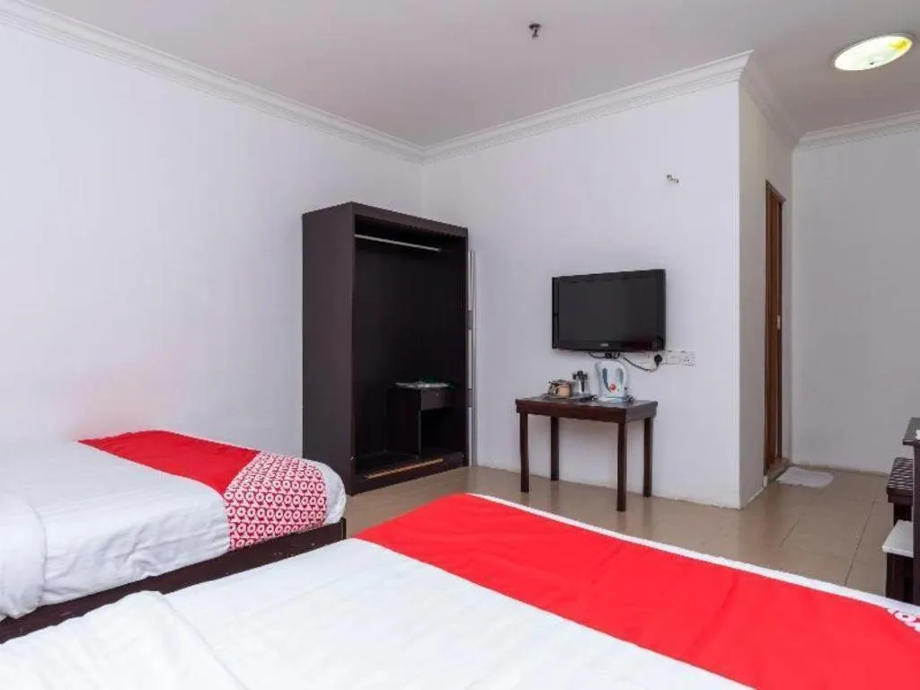 Bed in Super OYO 1114 Neo Pegasus Hotel