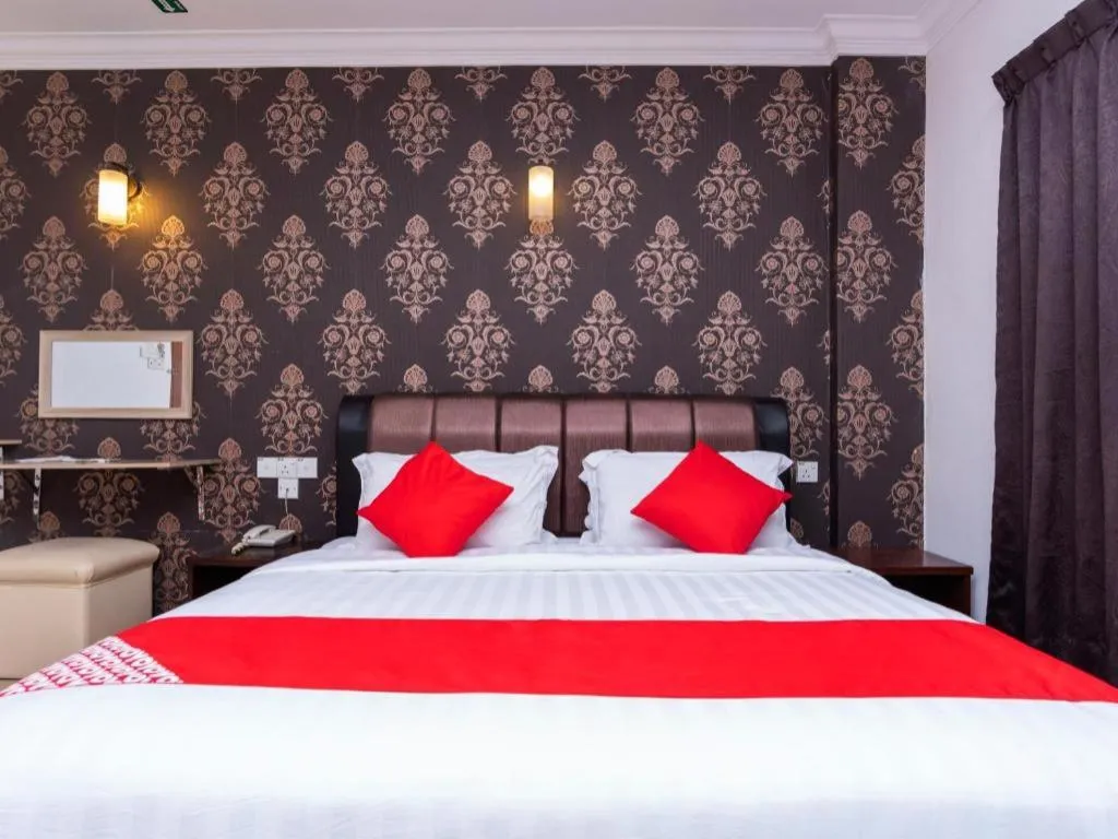 Bed in Super OYO 1114 Neo Pegasus Hotel