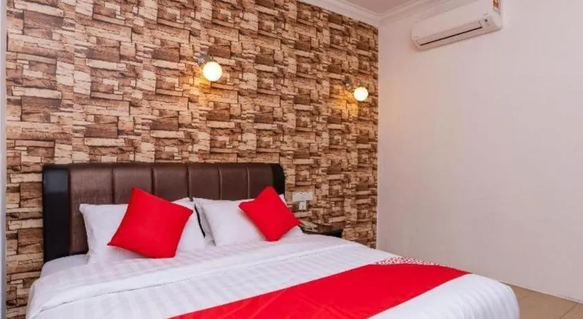 Bed in Super OYO 1114 Neo Pegasus Hotel