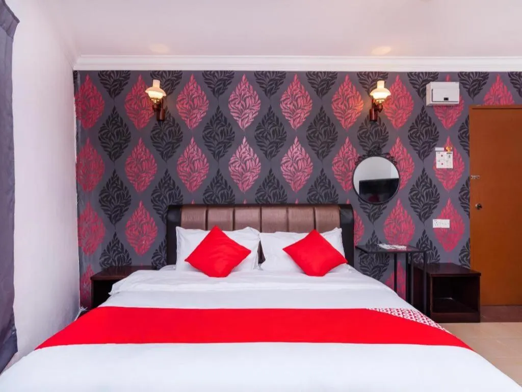 Bed in Super OYO 1114 Neo Pegasus Hotel