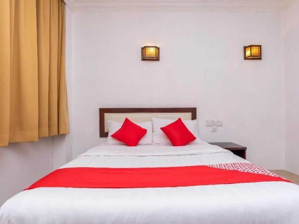 Bed in Super OYO 1114 Neo Pegasus Hotel