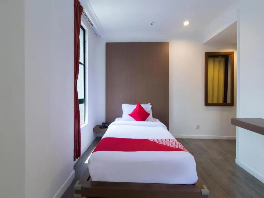 Bed in OYO 1045 Azimuth Hotel