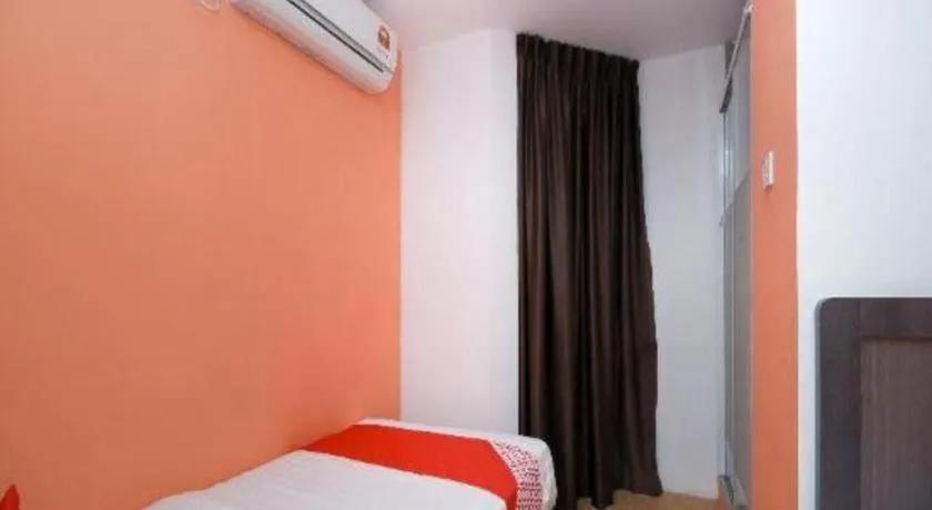 Bed in OYO 1111 Harmony Stay