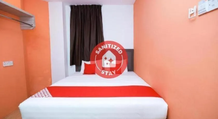 Bed in OYO 1111 Harmony Stay