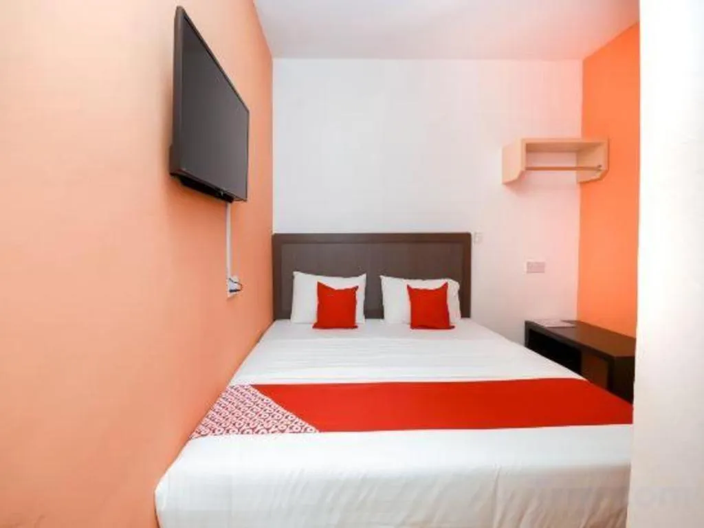 Bed in OYO 1111 Harmony Stay