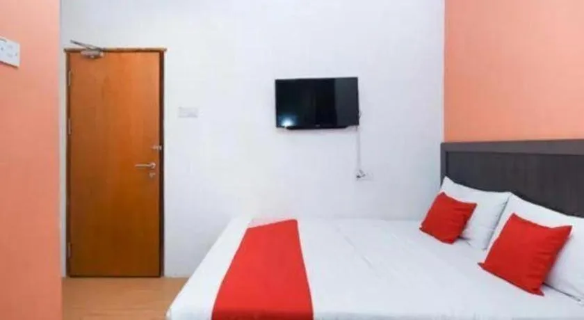 Bed in OYO 1111 Harmony Stay