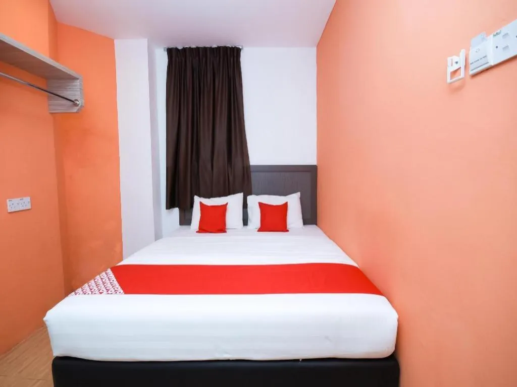 Bed in OYO 1111 Harmony Stay