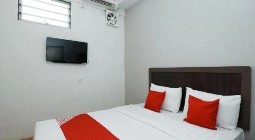 Bed in OYO 1111 Harmony Stay