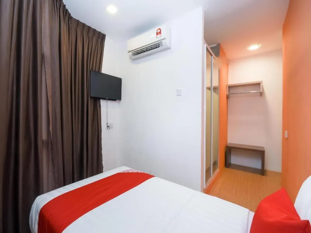 Bed in OYO 1111 Harmony Stay