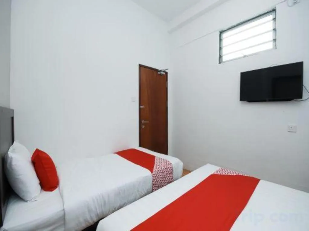 Bed in OYO 1111 Harmony Stay